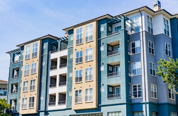 Exterior view of modern apartment building offering luxury rental units in Silicon Valley; Sunnyvale, San Francisco bay area, California